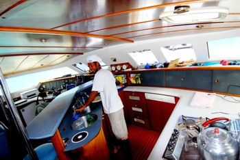 Turquoise catamaran interior kitchen