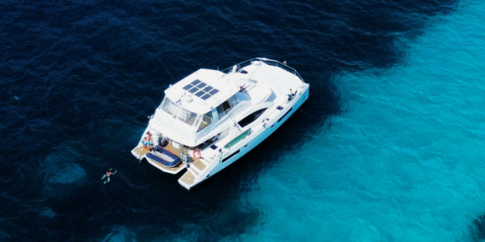 Luxury catamaran anchored in the turquoise waters of the Seychelles